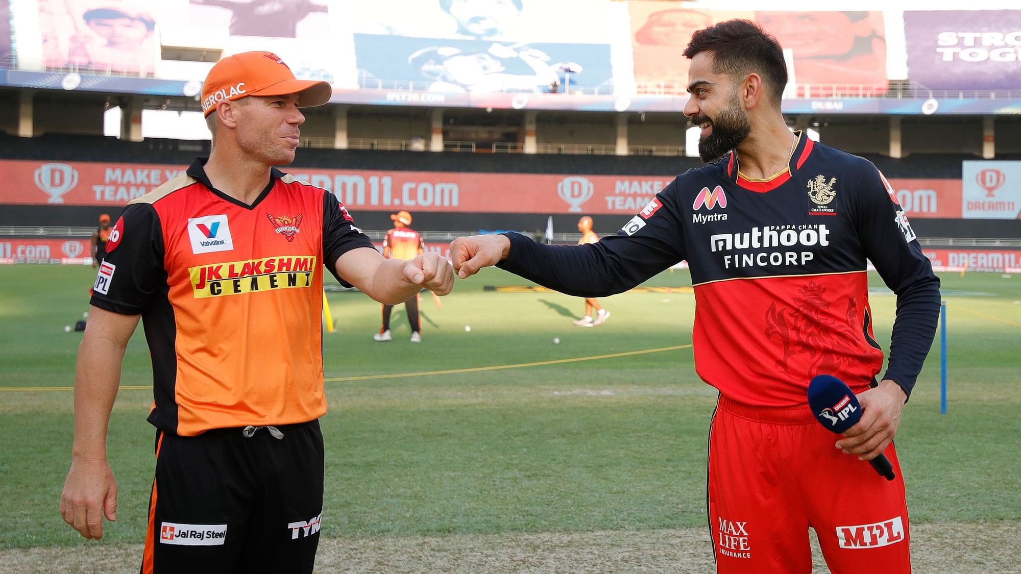 David Warner and Virat Kohli at the toss during their league stage game.