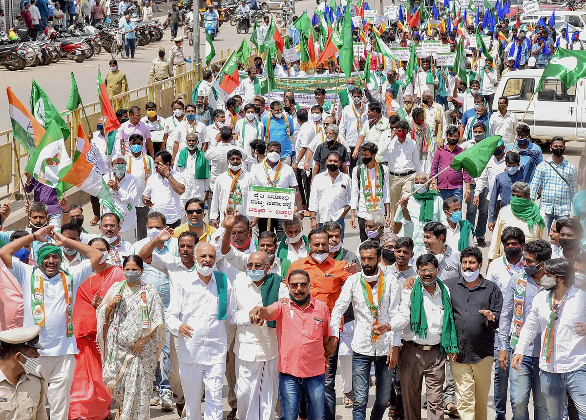 Members of various organisations along with farmers stage a protest against the passing of agriculture reform bills in the Parliament, in Shimoga, Monday, 28 September, 2020.