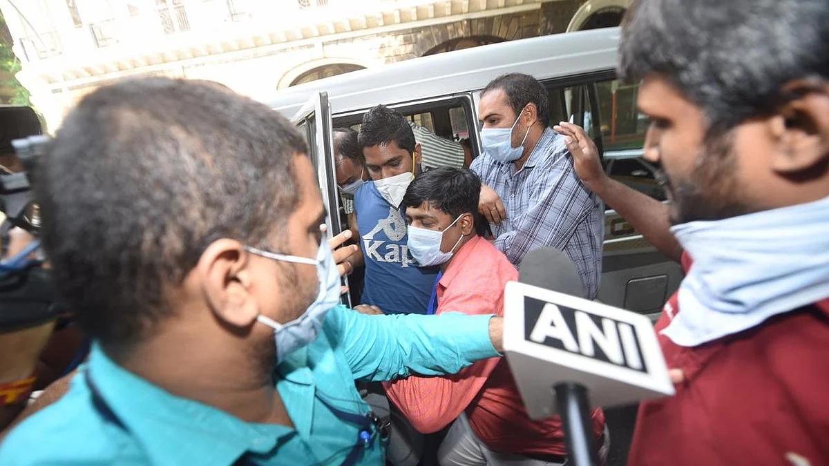 Samuel Miranda being taken for questioning.