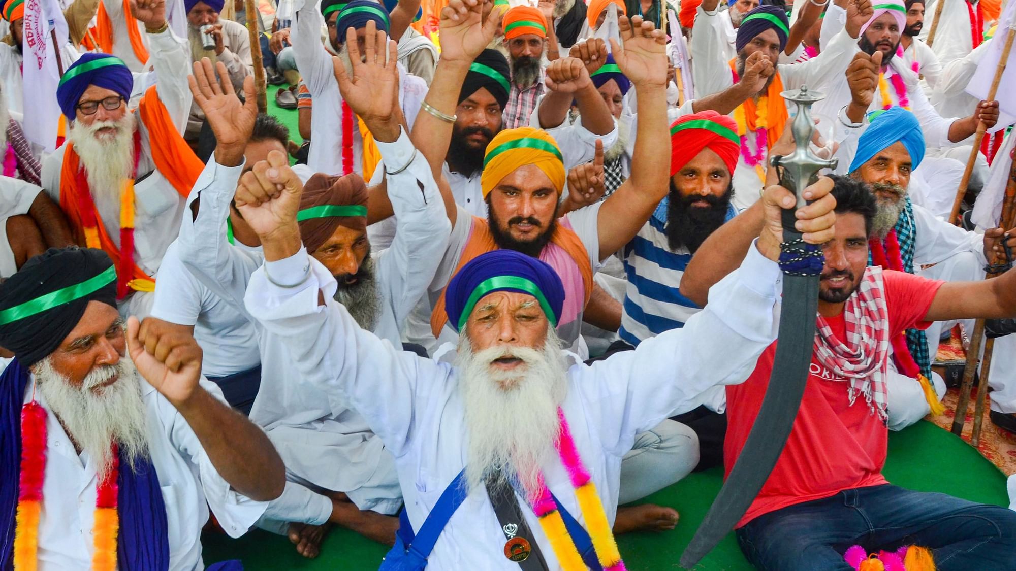 Activists and representatives of various farmers’ organisations raise slogans during a protest against Prime Minister Narendra Modi over the Electricity Amendment Bill 2020, plan of privatising the power distribution in the Union Territories and against agriculture-related ordinances brought by the Union government, in Amritsar.