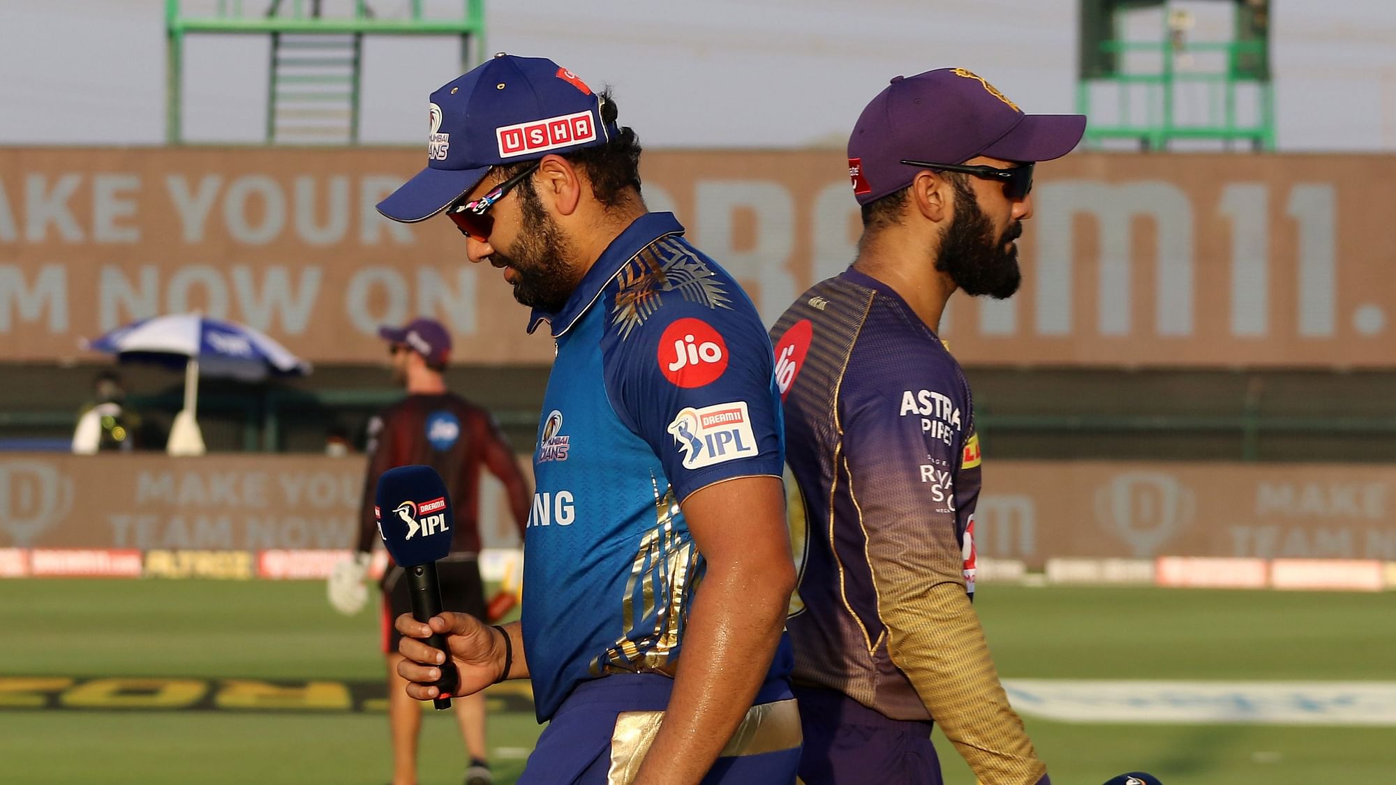 Dinesh Karthik captain of Kolkata Knight Riders and Rohit Sharma captain of Mumbai Indians during the toss of the match 5 of season 13 of the Dream 11 Indian Premier League (IPL) between the Kolkata Knight Riders and the Mumbai Indians.