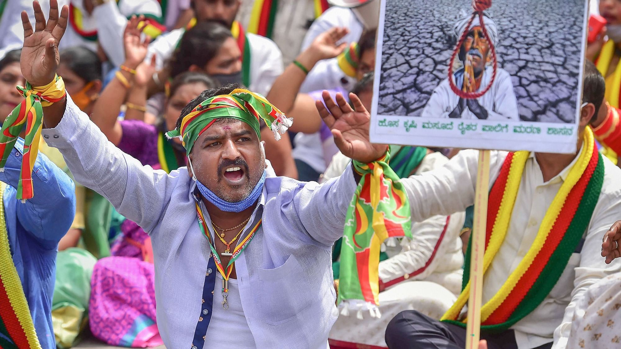 Members of various organisations along with farmers raise slogans during a protest against the farm reform bills passed in Parliament recently, in Bengaluru, Monday, 28 September, 2020.