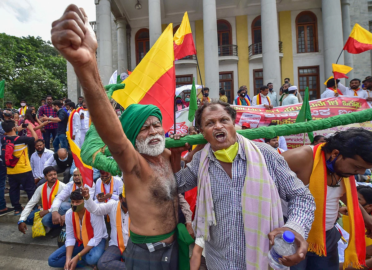 Members of various organisations along with farmers raise slogans during a protest against the farm reform bills passed in Parliament recently, in Bengaluru, Monday, 28 September, 2020.