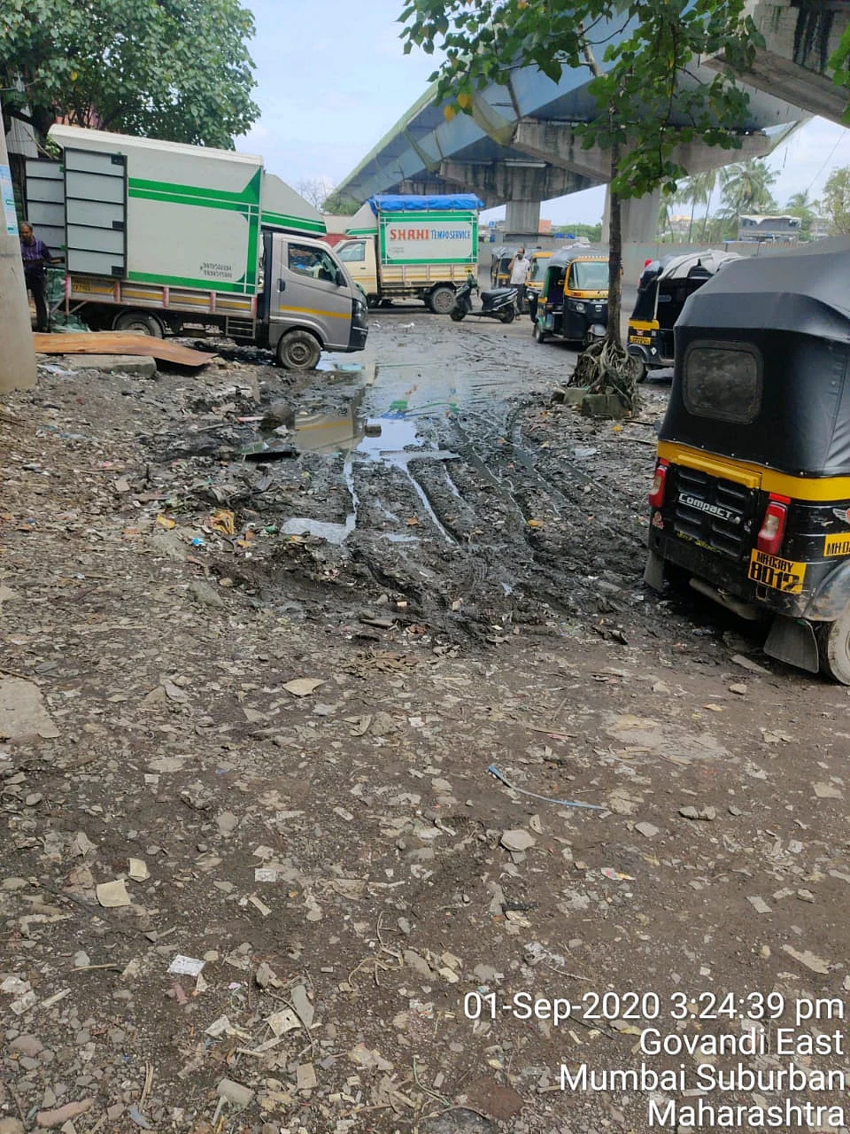 The road close to the potholes.