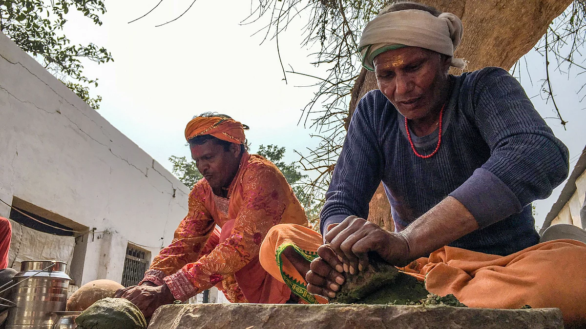 People at the local gaushala make bhang and thandai for welcoming visitors to the grand ceremony.