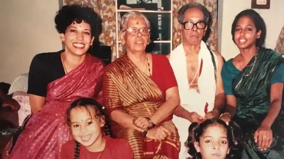 Kamala Harris sits draped in a sari during a visit to her family in India, with sister Maya Harris.