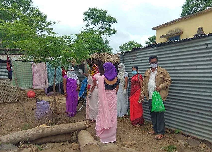 Anita Kadam (in red saree): ‘ASHAs do their tasks without complaining.’ 