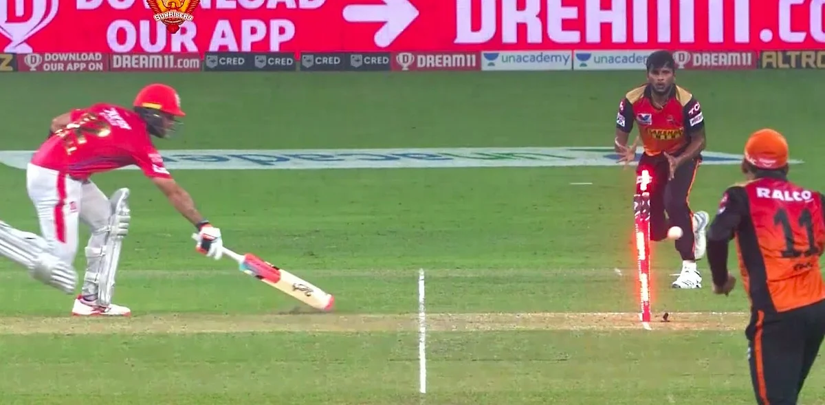 SRH’s Priyam Garg, with one stump visible hit the bulls-eye to dismiss Glenn Maxwell