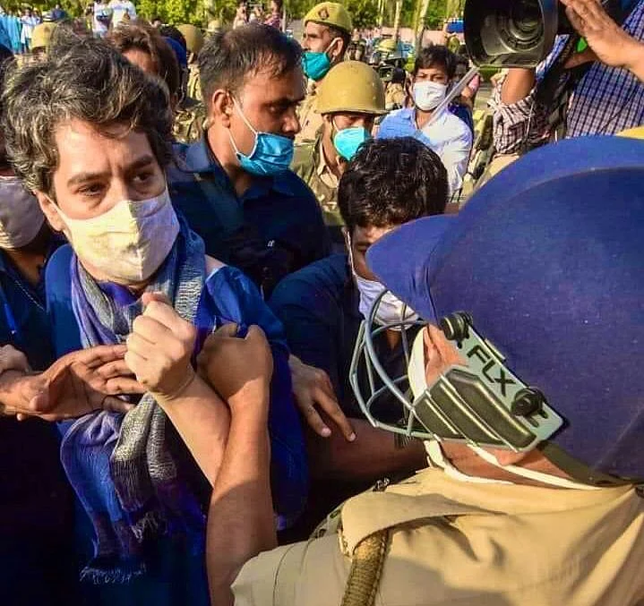 UP Police manhandling Priyanka Gandhi. 