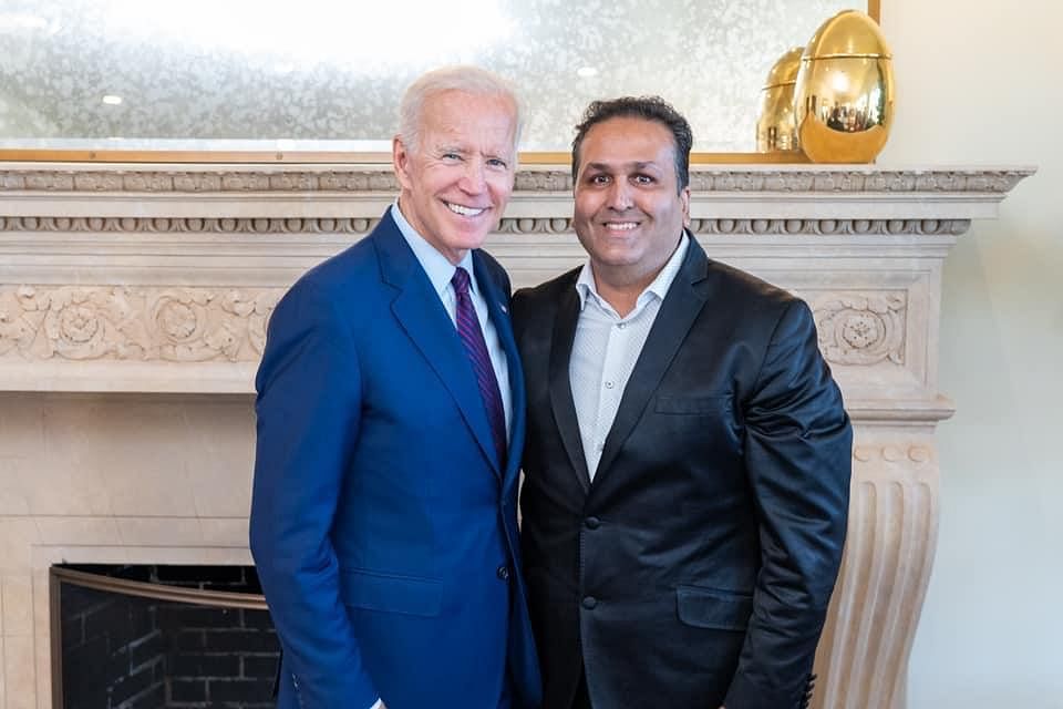 Ajay Bhutoria (R) with Biden.