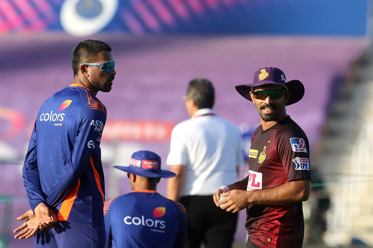 Hardik Pandya of Mumbai Indians speaks with Dinesh Karthik of Kolkata Knight Riders before the start of the Mumbai Indians vs Kolkata Knight Riders game.