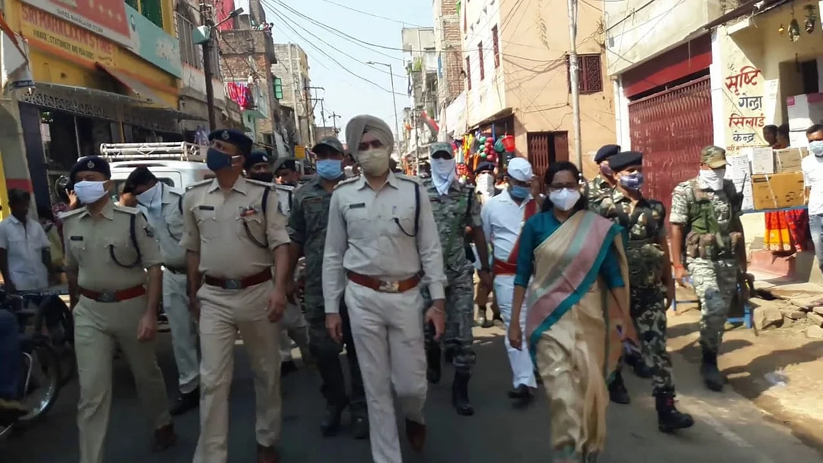 Munger situation normal, shops open, police conducts flag march
