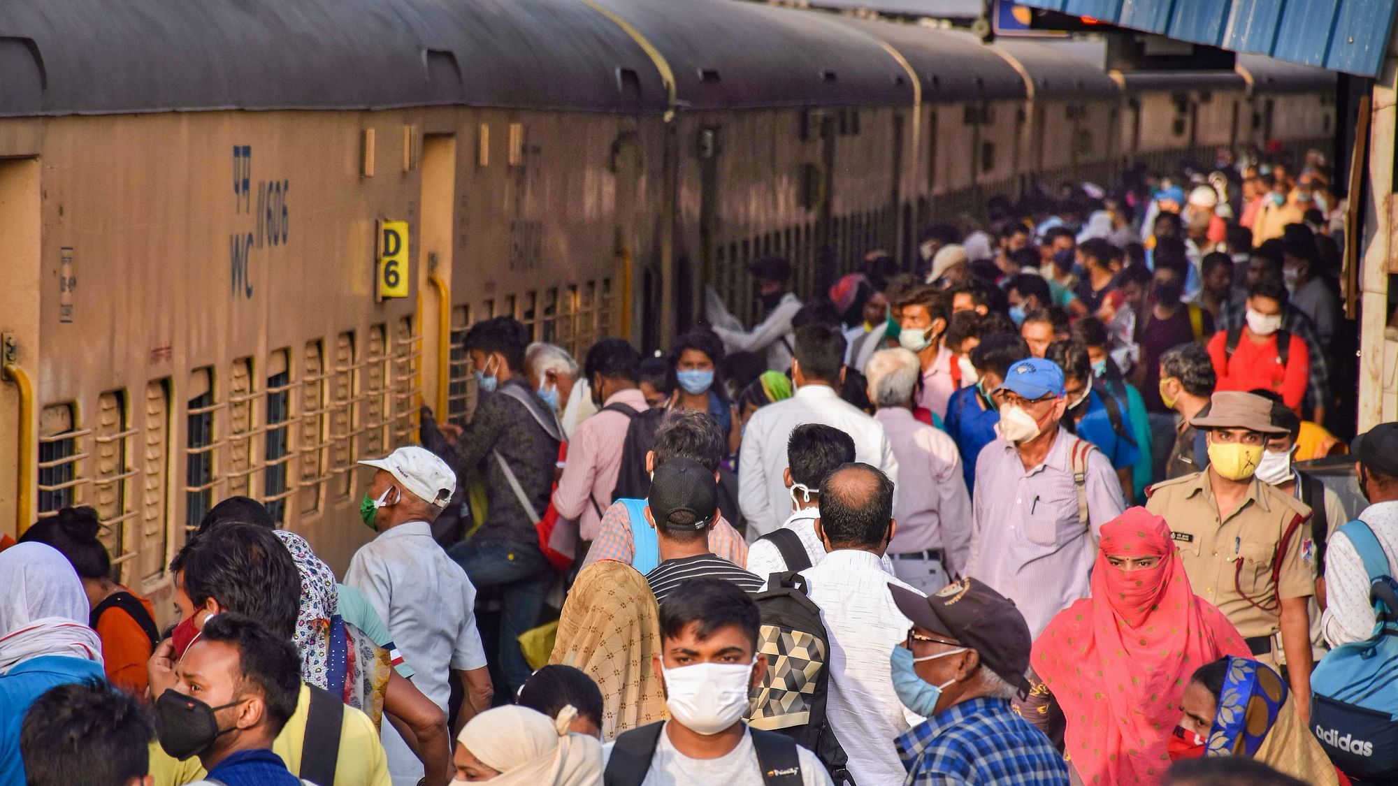Passengers board a train in Lucknow.