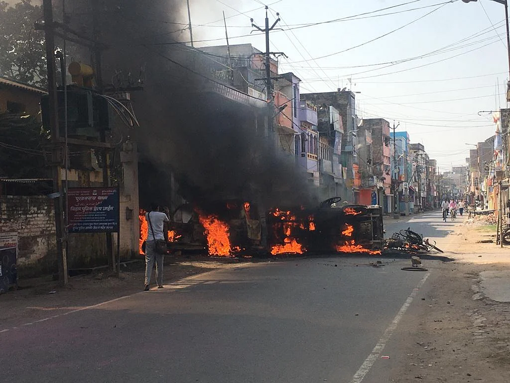 Munger Unrest: Cops on Patrol After Angry Mob Torches Police Vans
