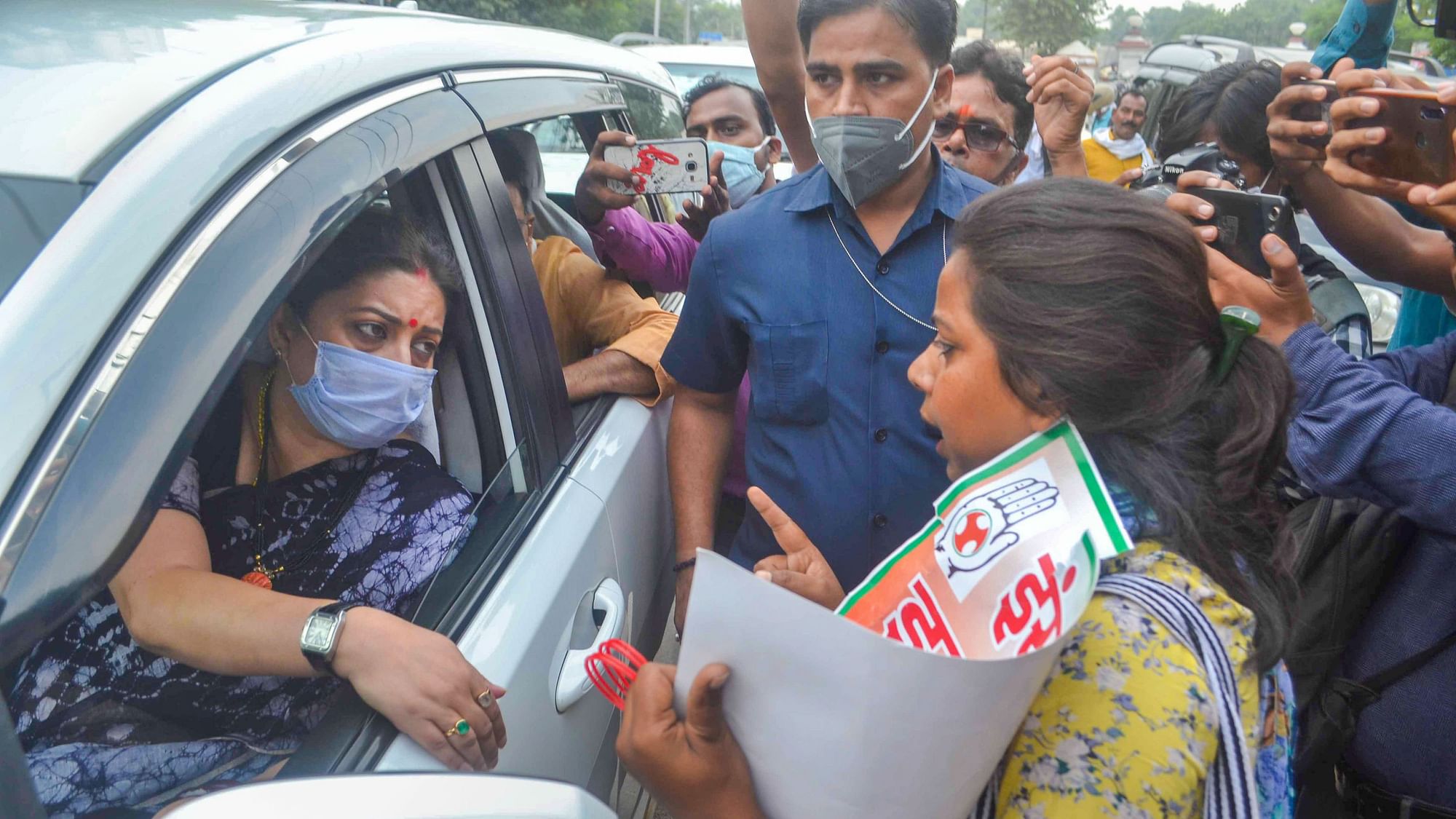 Congress workers, aggrieved by Irani’s comments, tried to stop her car in Varanasi on Saturday, 3 October, chanting “Smriti Irani go back” and “we want justice” slogans.