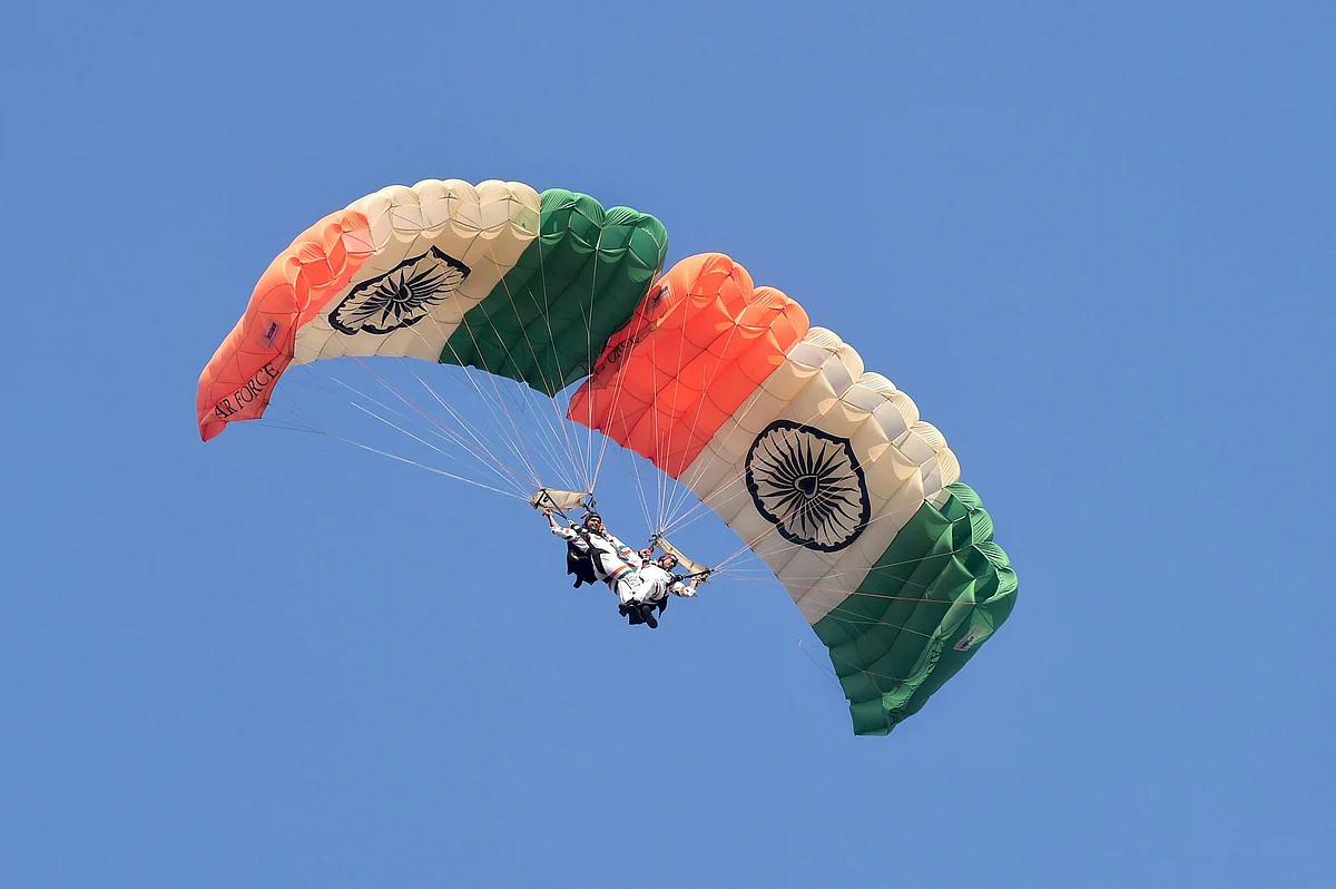 An Indian Air Force paratrooper performs during the 88th Air Force Day parade at Hindon airbase in Ghaziabad.