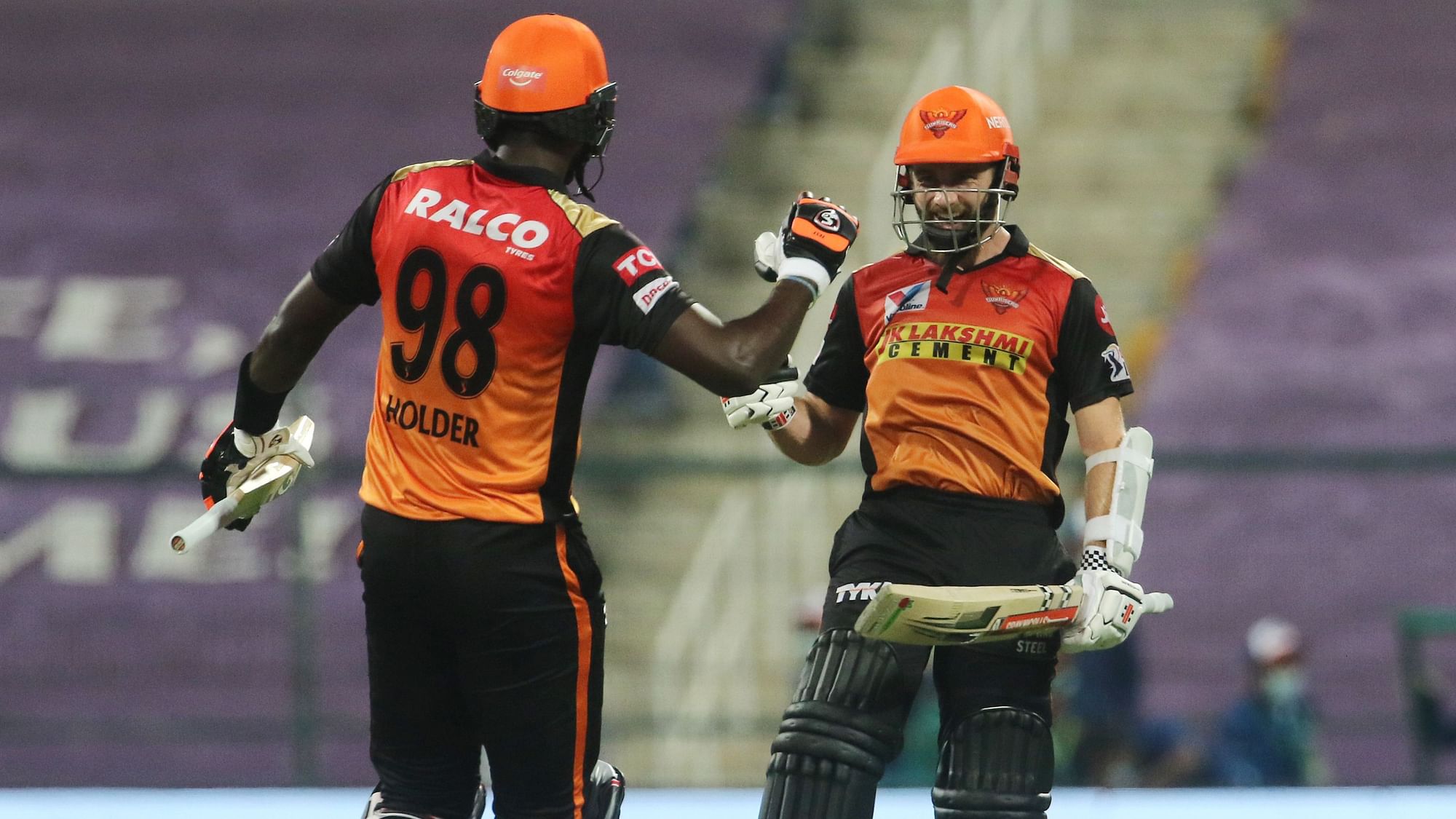 Jason Holder and Kane Williamson celebrate after taking SRH over the line for a six-wicket win against RCB in the Eliminator.&nbsp;