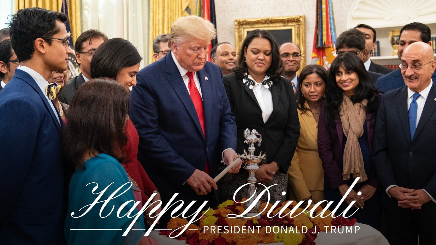 Outgoing President Donald Trump lights a diya at the White House.&nbsp;