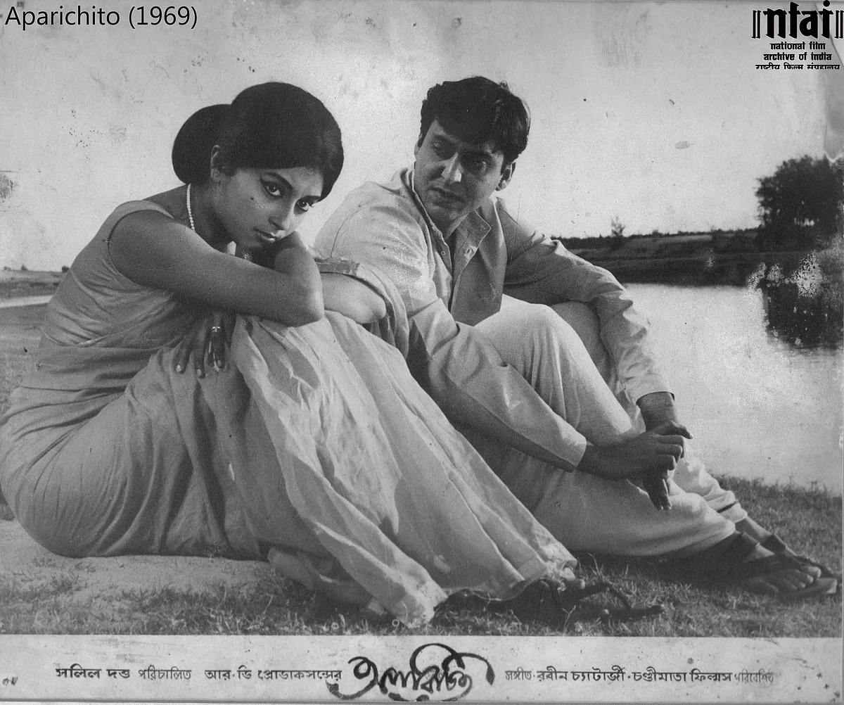 Soumitra Chatterjee and Aparna Sen in a still from <i>Aparichita</i>.