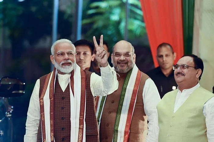 Prime Minister Narendra Modi arrives to address his supporters at the BJP headquarters in New Delhi in October 2019 after declaration of Haryana and Maharashtra assembly polls’ results. JP Nadda photographed behind Modi-Shah. 