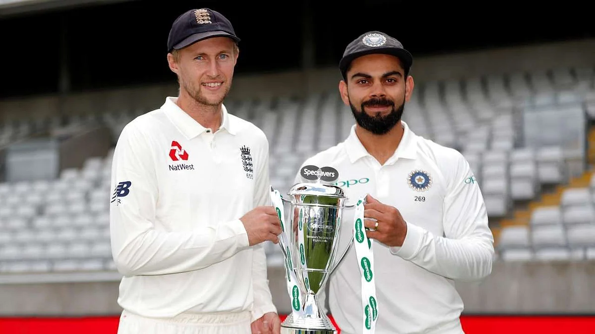 Virat Kohli and Joe Root pose with the trophy. 