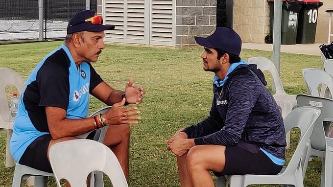 Ravi Shastri and Shubman Gill in conversation during a training session.&nbsp;