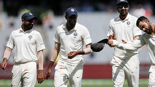 Mohammed Shami, Jasprit Bumrah and Ishant Sharma share a light moment with Virat Kohli. 