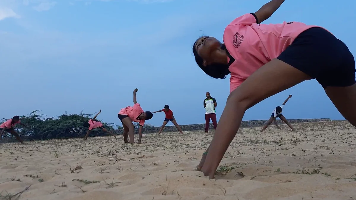 Most of the girls train bare-foot in their home clothes.