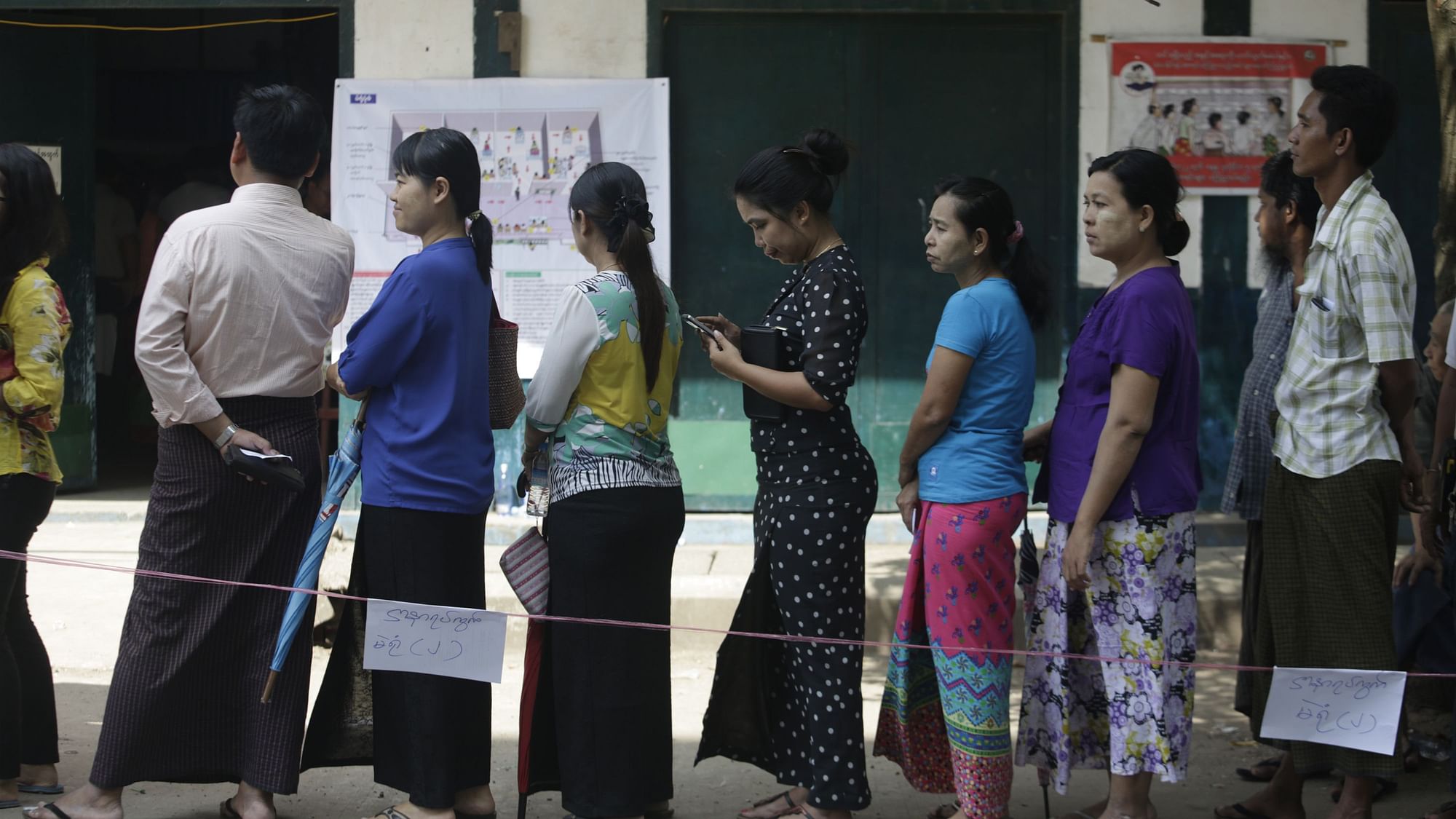 File photo. People queue to cast their votes at a polling station in Yangon, Myanmar, November 8, 2015.