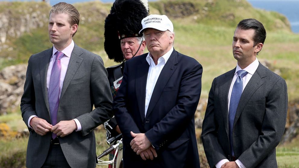 Eric Trump standing to the left of Donald Trump