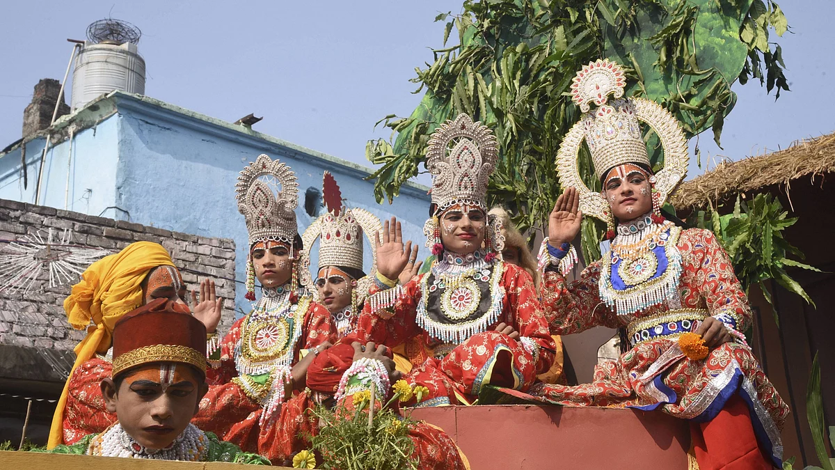A tableau depicting Lord Ram passes through a street on the eve of Diwali festival, in Ayodhya, Friday, 13 November.