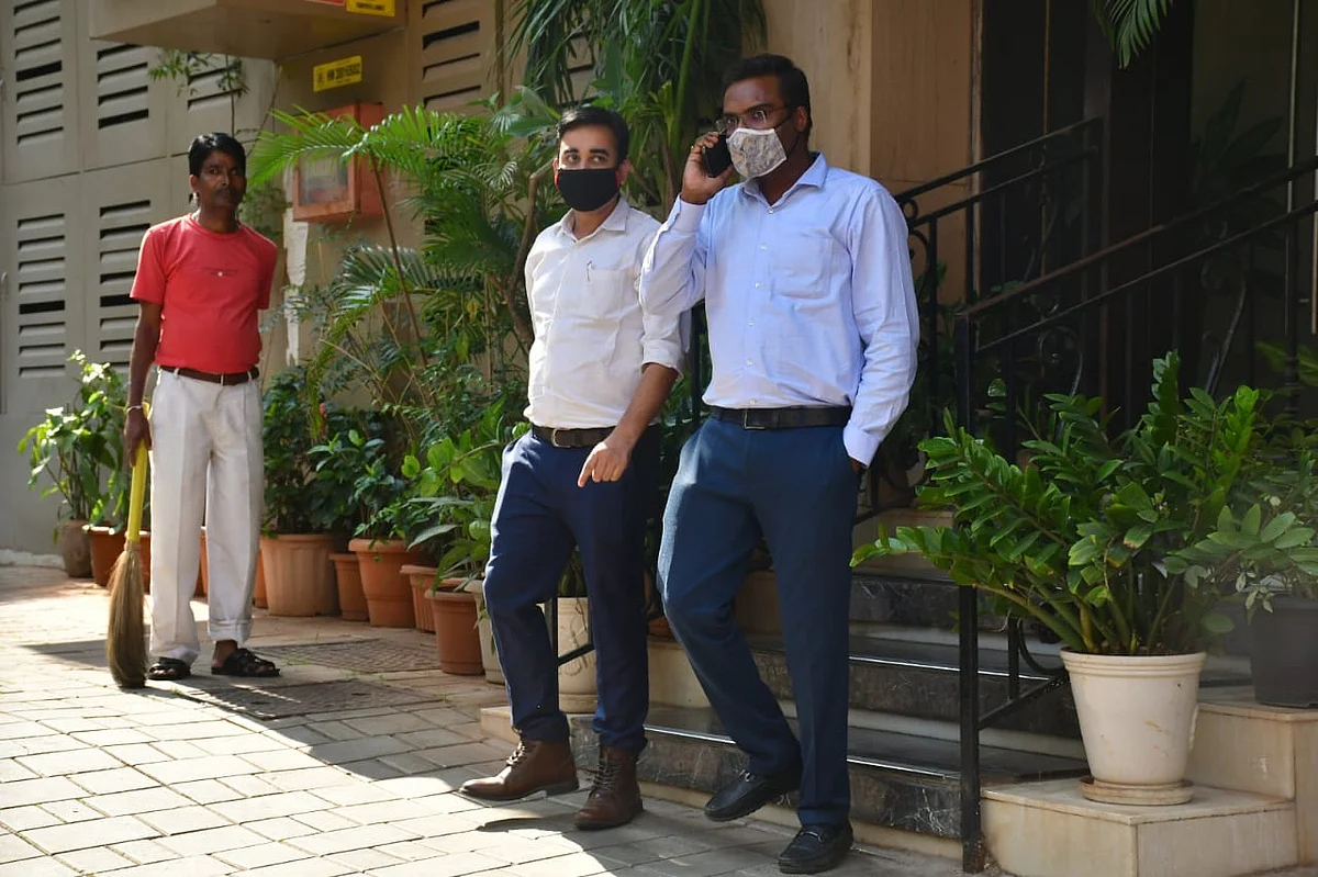 NCB officials at Arjun Rampal's house.