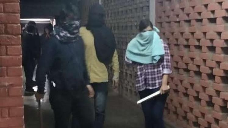 A screenshot of the masked mob attacking students and vandalising JNU’s Sabarmati Hostel.