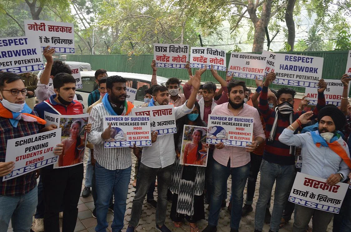 AISA and SFI protested in front of the Department of Science and Technology, demanding the resignation of Dr Harshvardhan.