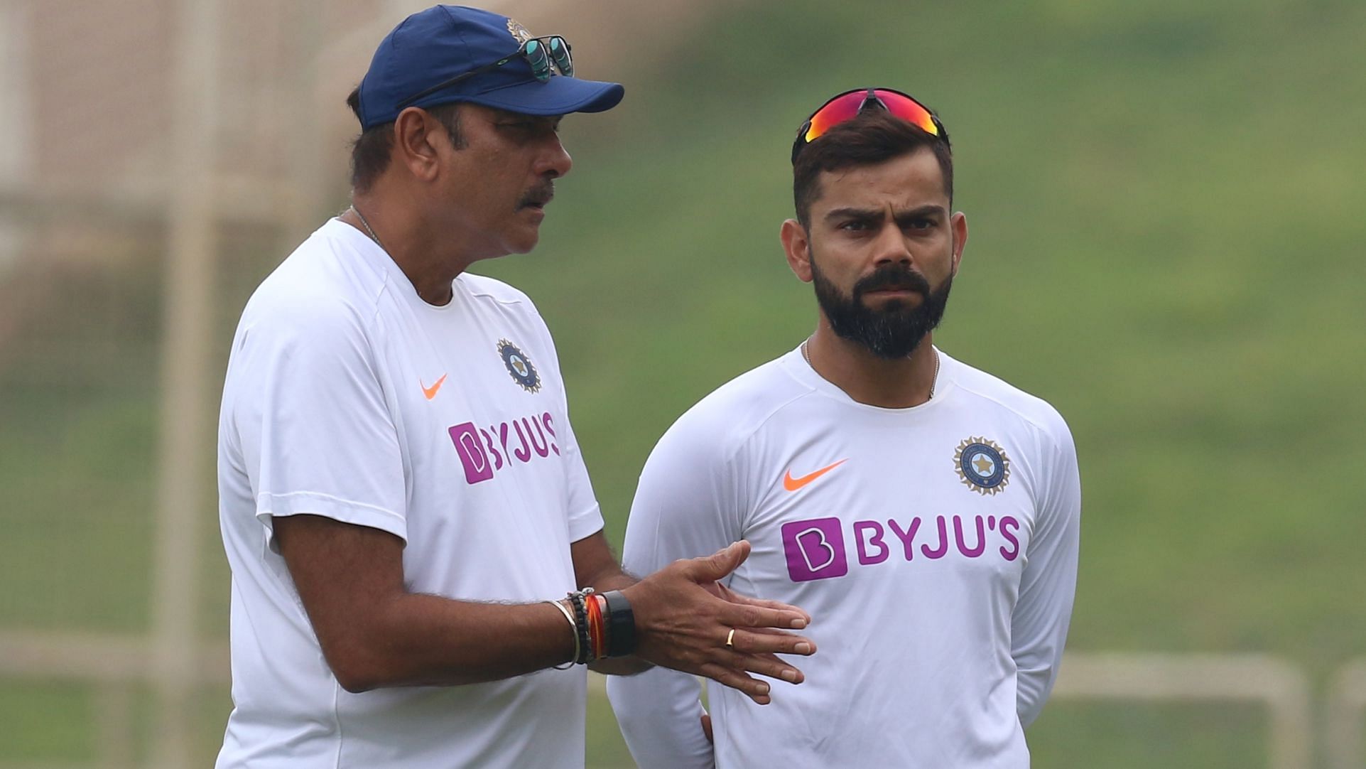 India coach Ravi Shastri (left) and Virat Kohli brings during a training session.&nbsp;