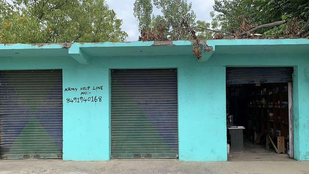 Army’s ‘helpline number’ in Amshipora. Often it is used by locals to tip off forces about the presence of militants.