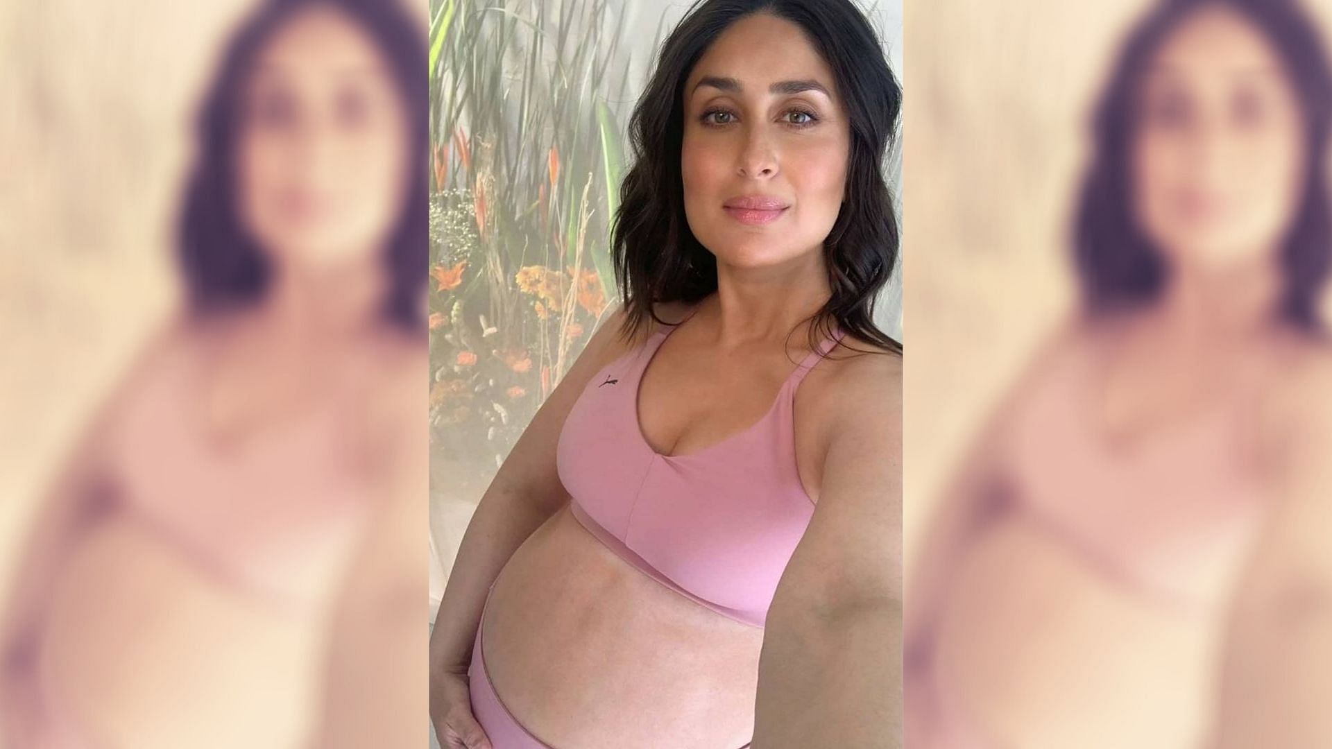 Mom-to-be Kareena Kapoor takes a selfie during a photo shoot.
