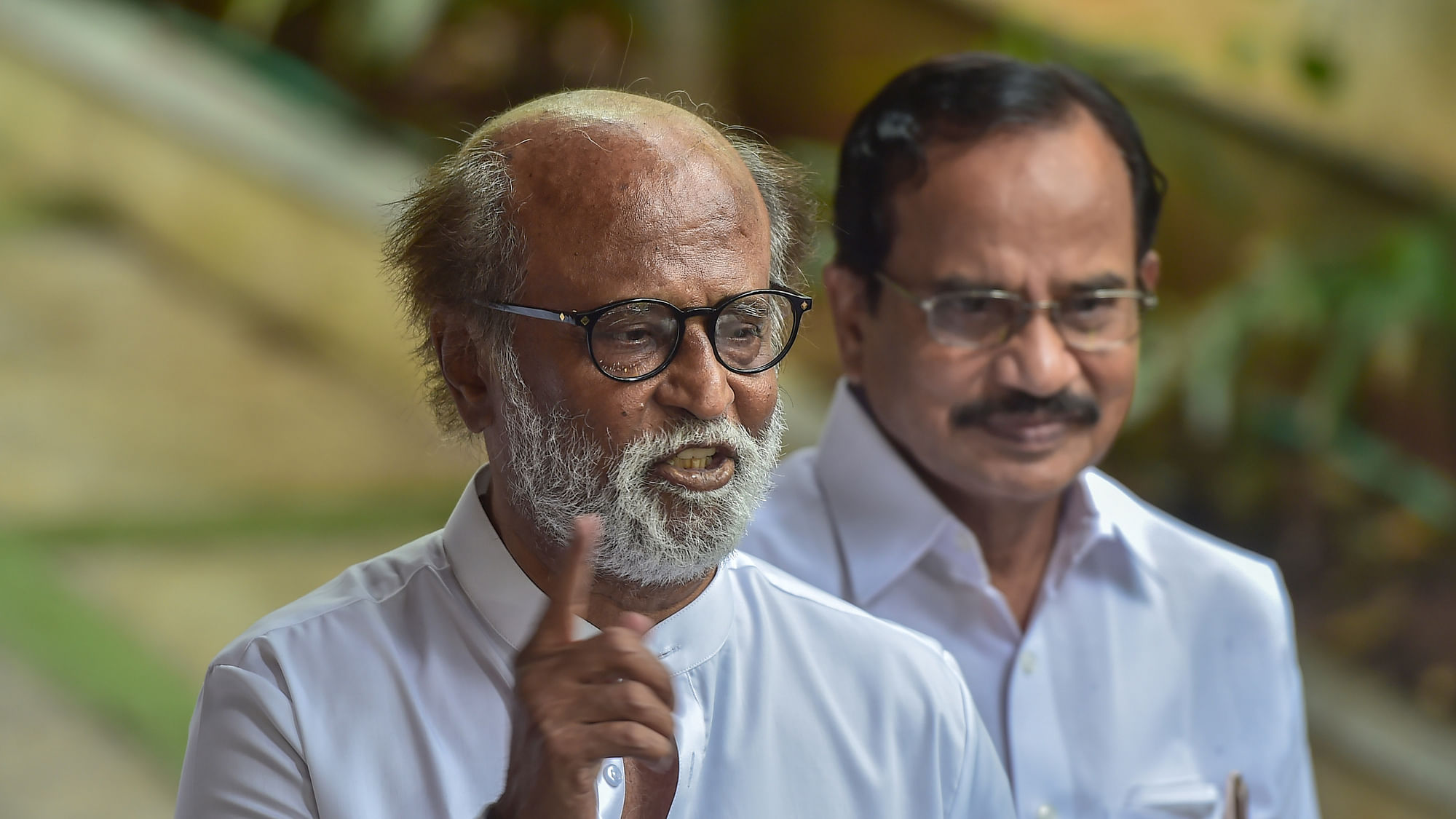 Actor-turned-politician Rajinikanth gestures addresses a press conference to announce the launch of his political party in January 2021, in Chennai, Thursday, 3 December, 2020.