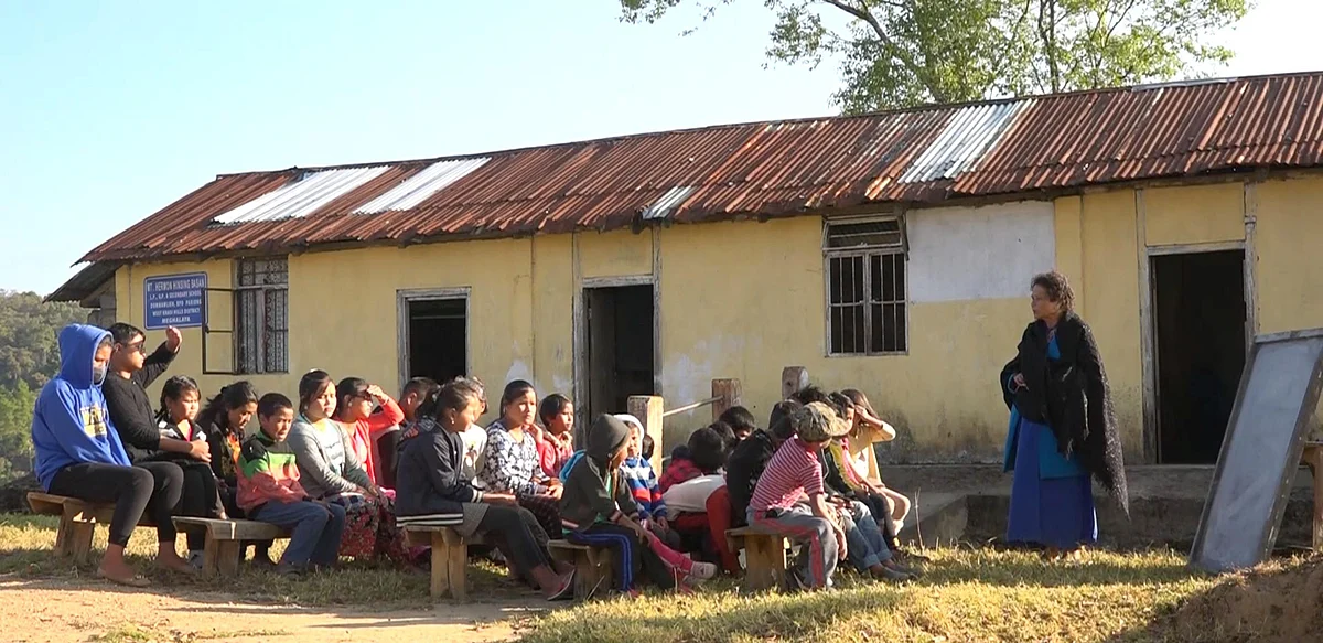 Queentina and her students at the Mount Hermon Hinsing Basan Vocational School.