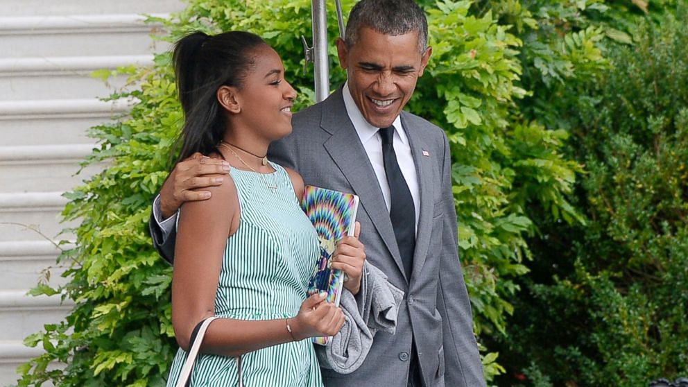 Barack Obama with Sasha.