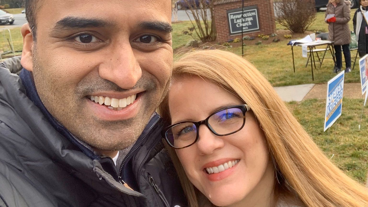 Maju Varghese with his wife Julie, after casting their votes in the Democratic Party primary in Virginia, in March 2020.