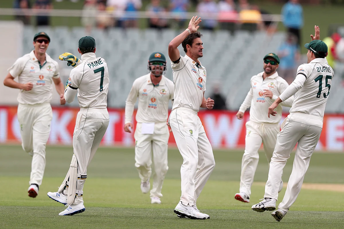 Australia’s Mitchell Starc, third right, celebrate with teammates after bowling India’s Prithvi Shaw during their cricket test match at the Adelaide Oval in Adelaide, Australia, Thursday, Dec. 17, 2020.