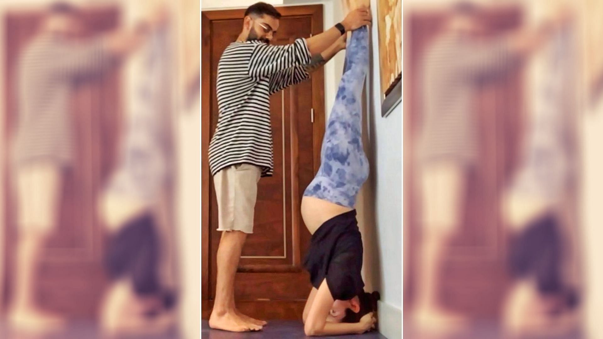 Anushka Sharma practices yoga with help from Virat Kohli.