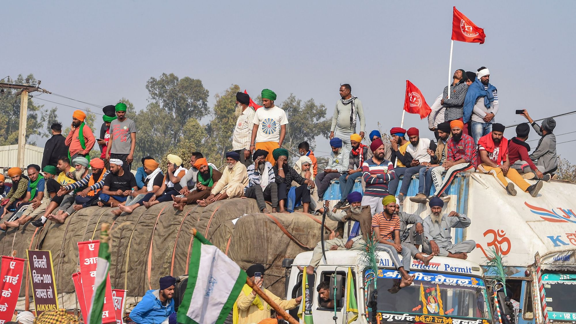 Farmers gather at the Singhu border during their ongoing ‘Delhi Chalo’ protest against the new farm laws.