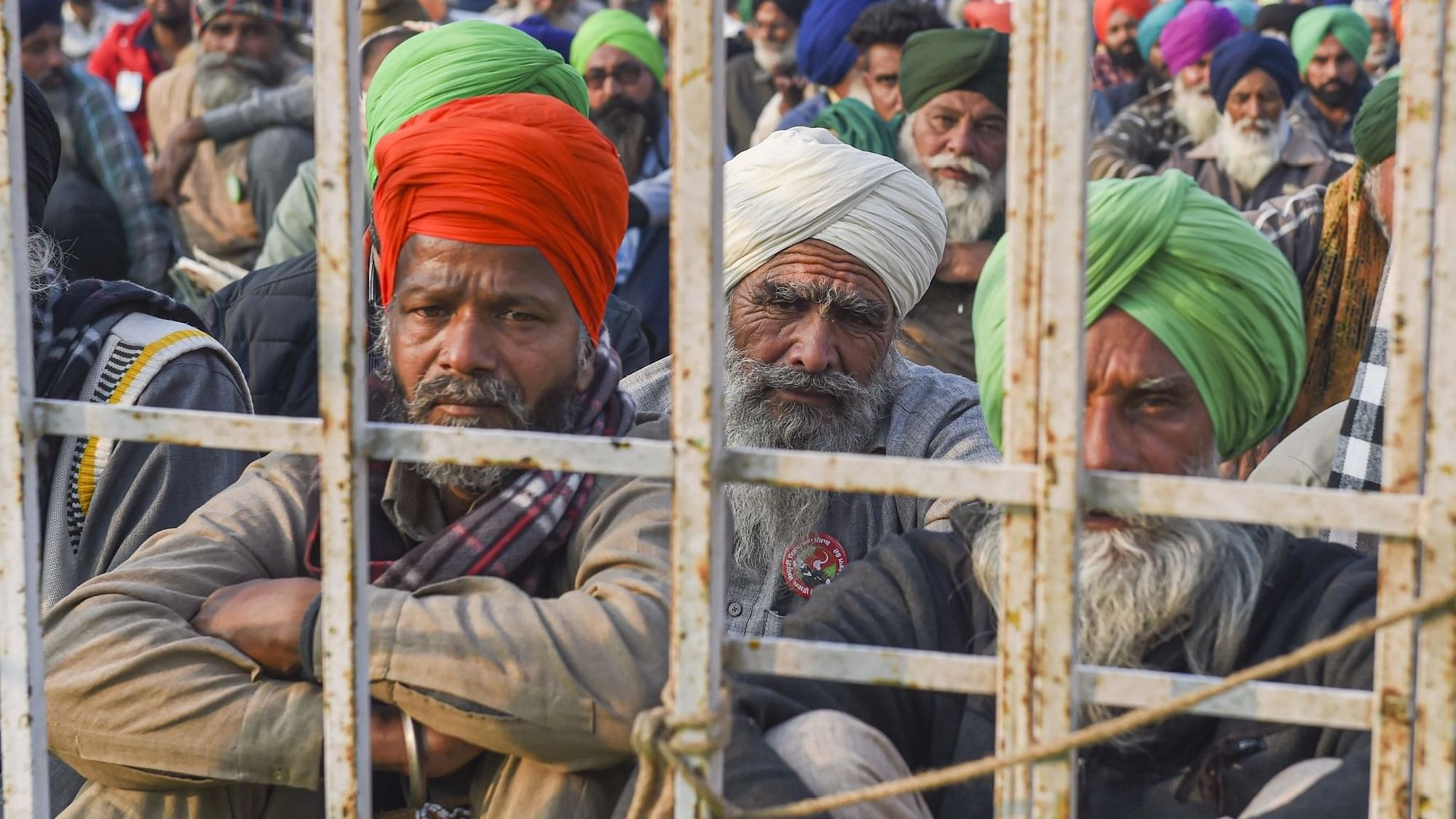Farmers during a protest against the new farm laws at the Singhu Border on  24 December 2020. 