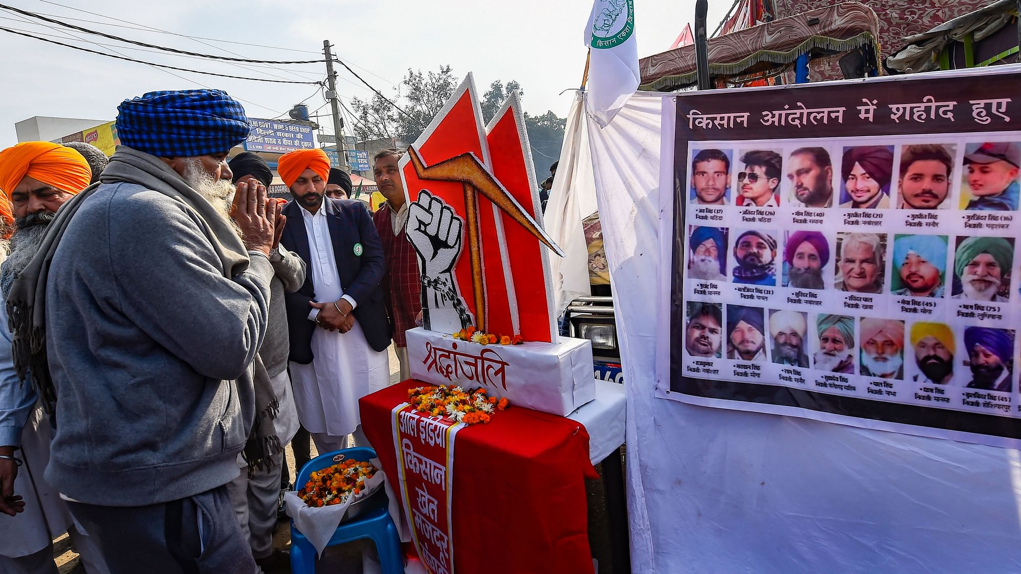 Farmers pay tribute to those who lost their lives during the farmers agitation, as they gather at Singhu border.