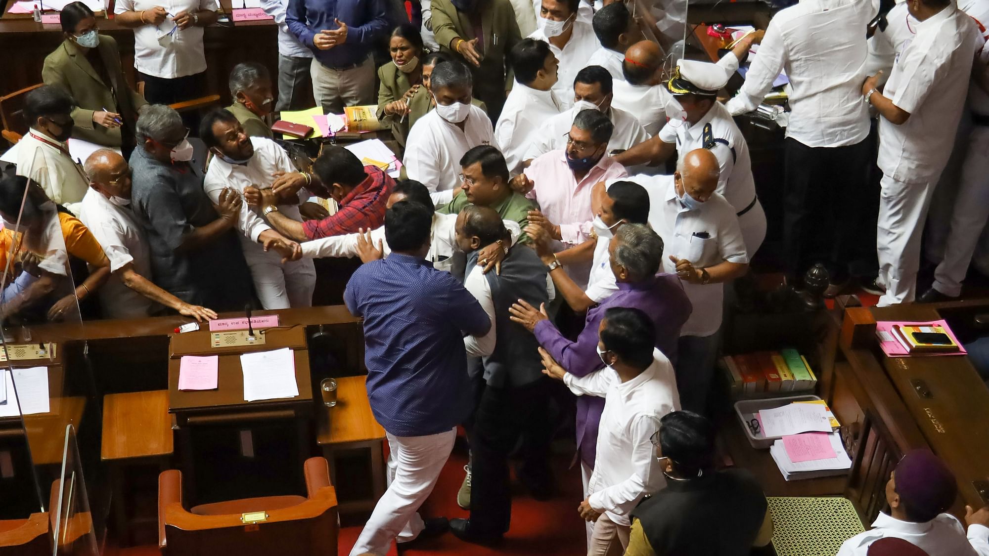 BJP members reportedly prevented the Chairman from chairing the one-day session, while Congress members in the House evicted the Deputy Chairman from the chair.