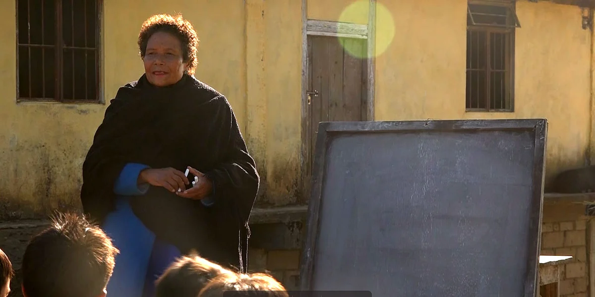 Queentina Diengdoh taking classes outside the school.