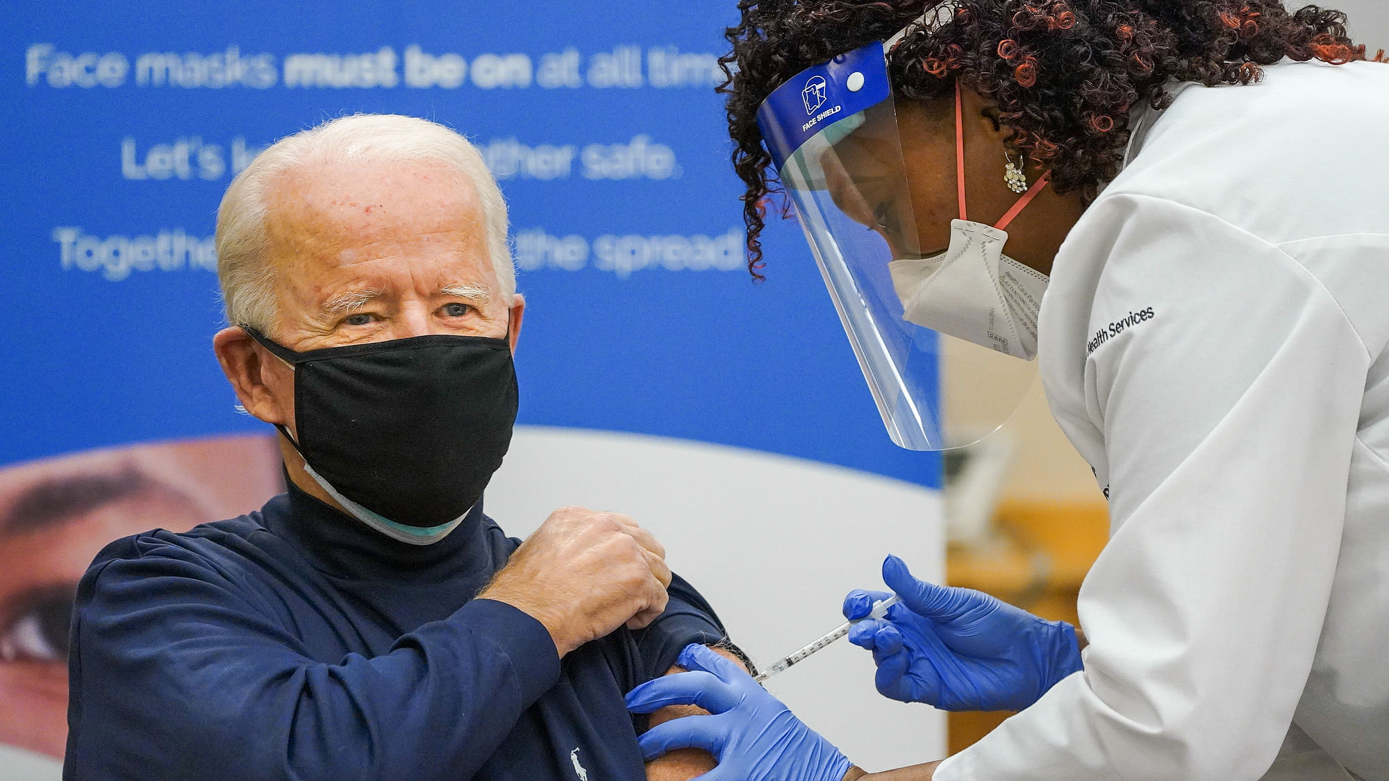 Joe Biden receiving the Pfizer vaccine.