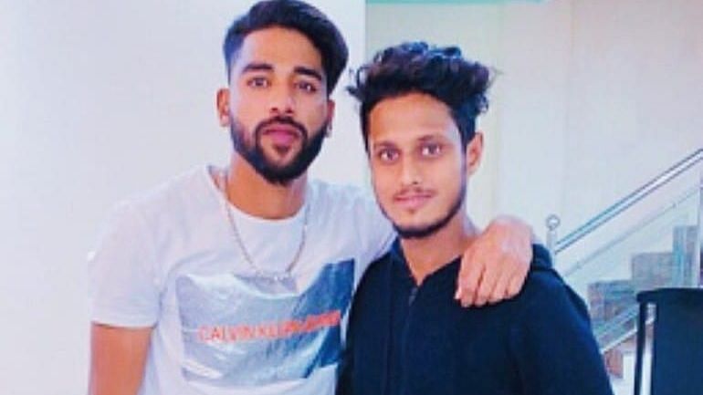 Mohammed Siraj with Mohammed Shafi